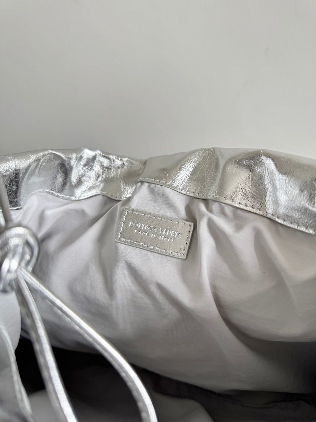 Bottega Veneta 2026 Dust Bag Silver Laminated Leather